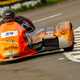 A photo of the orange number 21 bike ridden by César Chanal and Olivier Lavorel.